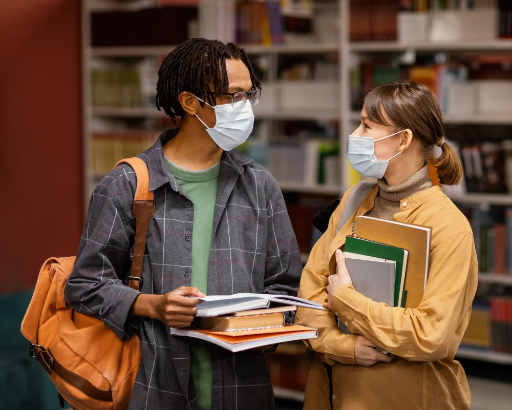 Students talking while wearing facemasks