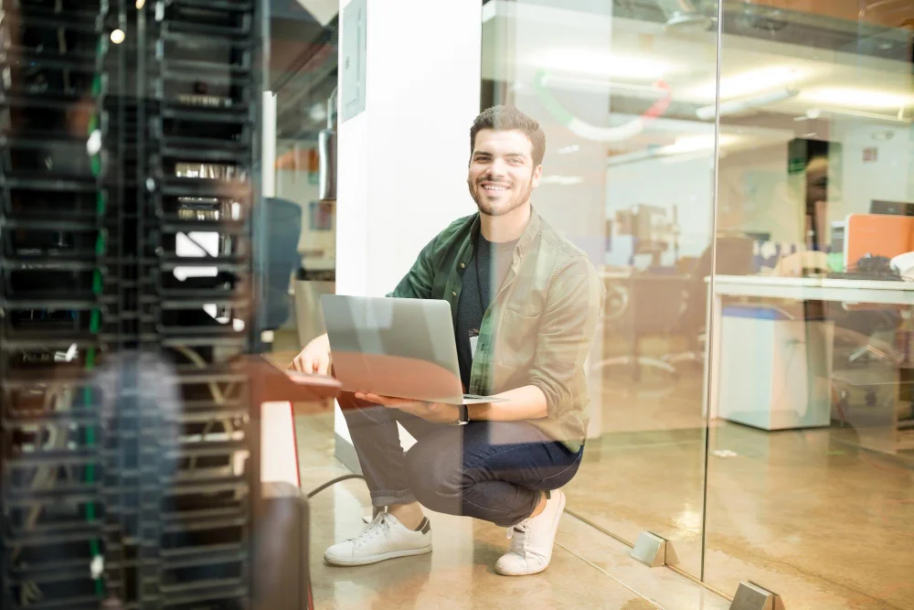 a Cisco Certified Network Professional Collaboration (CCNP Collaboration) man working
