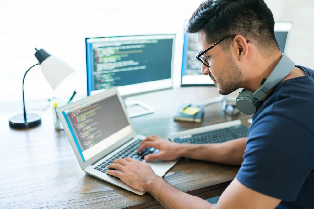 a picture iof a Cisco Certified DevNet Professional workiing